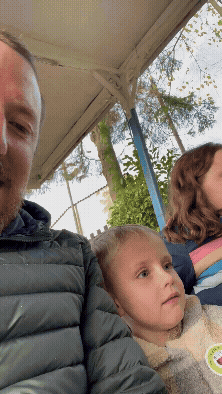 A short moving image of Mikey and family on a tram ride